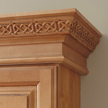 Close-up of Celtic insert in crown moulding
