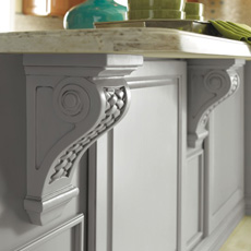 Corbels providing countertop support on a kitchen island