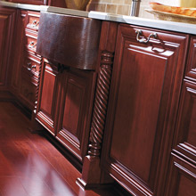 Burgundy kitchen cabinets with turning style cabinet legs