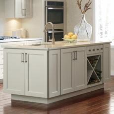 Kitchen island made up of base cabinets, including a wine storage cabinet