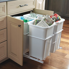 Recycling center base cabinet with four bins pulled out