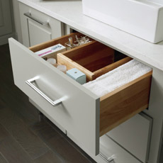 U-shaped vanity drawer opened to show interior storage