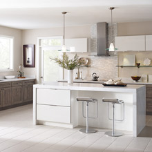 Diamond semi-custom kitchen cabinets in woodgrain and white high gloss laminate
