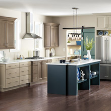 Diamond semi-custom kitchen cabinets with a blue island