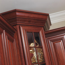 Stacked crown moulding on top of cabinets