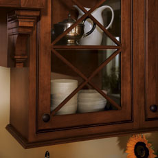 Close up of an inset cabinet with glass door