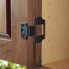 Finial hinge on the inside of a cabinet