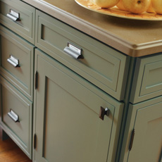 Close up of cabinets with bronze cabinet pulls, knobs and hinges