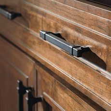 Close up of cabinet with matte black pulls