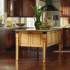 Dark cherry kitchen with painted yellow kitchen island