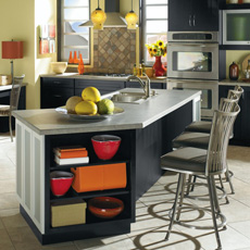 Angled black kitchen island with open shelving and seating