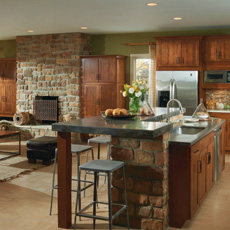 Open plan design with island separating kitchen and living space