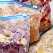 Prepared meals in plastic bags for freezing