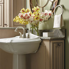 Consider the overall design for your space, like this cabinet for a bathroom remodeling project.