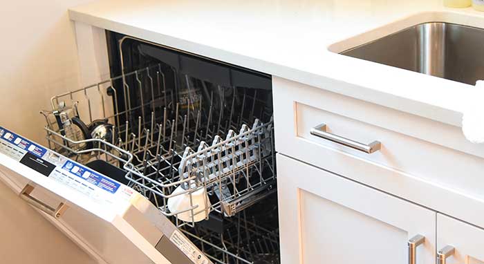 Close-up of dishwasher with appliance panel