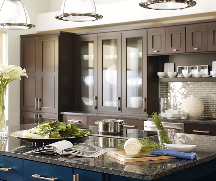 Dark wood Metro cabinets in Truffle finish with a Blue Lagoon kitchen island