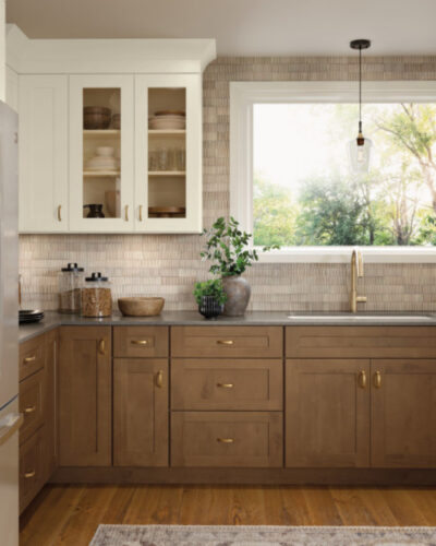 Mid-tone stain on the base cabinets reflect the Finish of the Year.