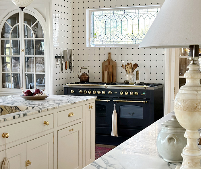 Traditional Inset Cabinetry Pairs with Custom Color While Fashioning French Flair