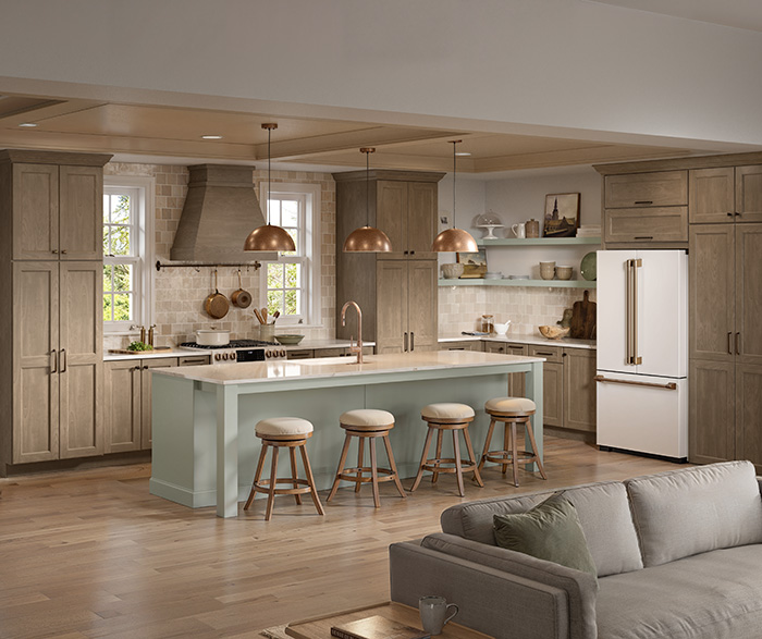 neutral kitchen painted in light brown with light blue kitchen island